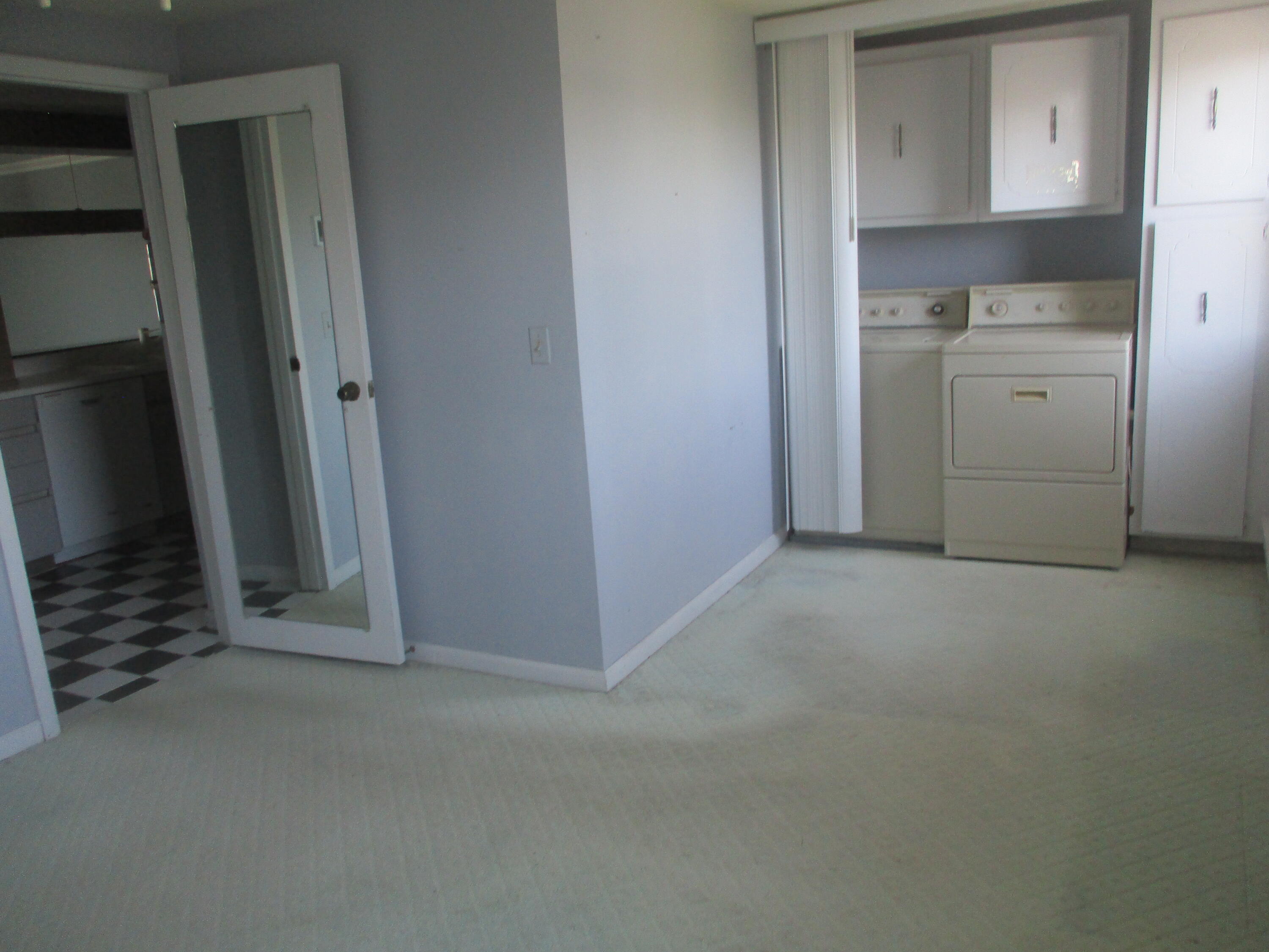 112 Old Wharf Road, Unit E4 Dennis Port, MA 02639 - Photo 15 of 15 a view of a refrigerator in kitchen and utility room