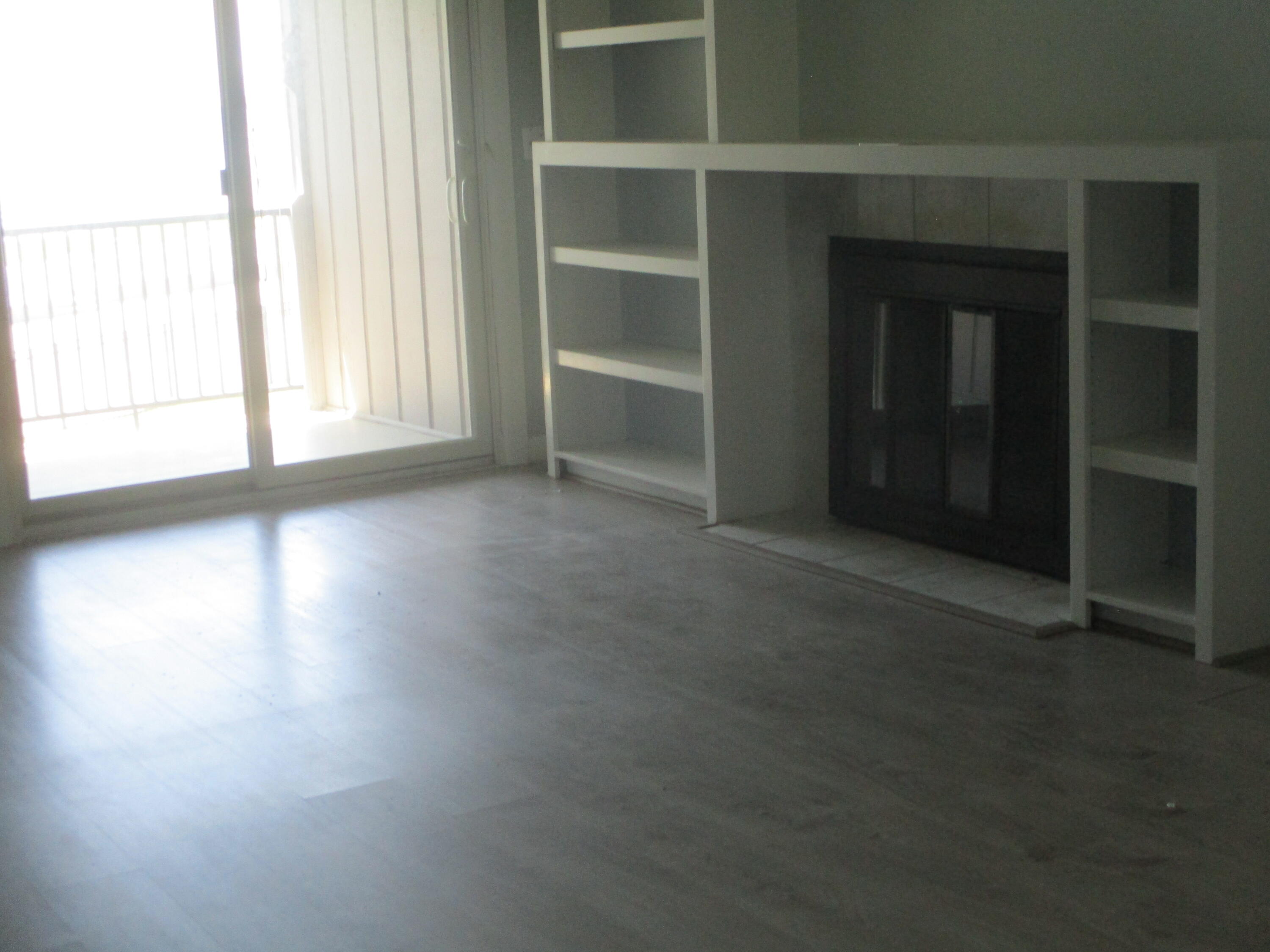 112 Old Wharf Road, Unit E4 Dennis Port, MA 02639 - Photo 4 of 15 a view of an empty room with a window