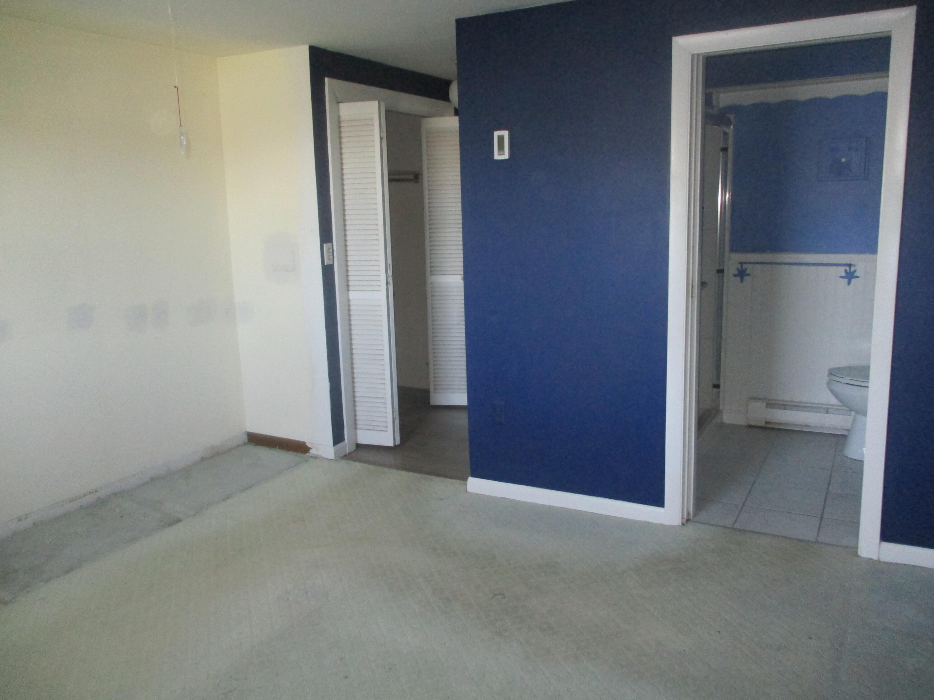 112 Old Wharf Road, Unit E4 Dennis Port, MA 02639 - Photo 10 of 15 an empty room with a bathroom