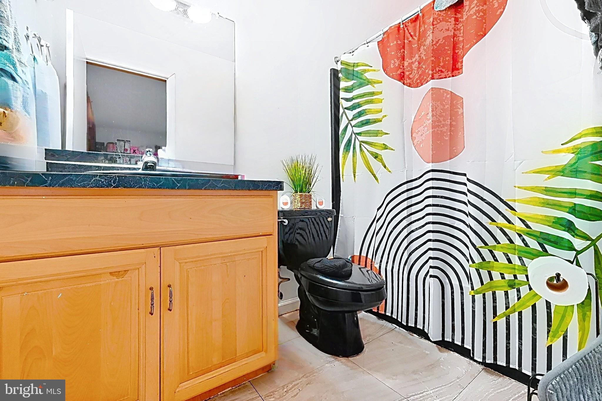 4341 Pine Ridge Drive East Bushkill, PA 18324 - Photo 7 of 19 Vibrant bathroom with modern flair.