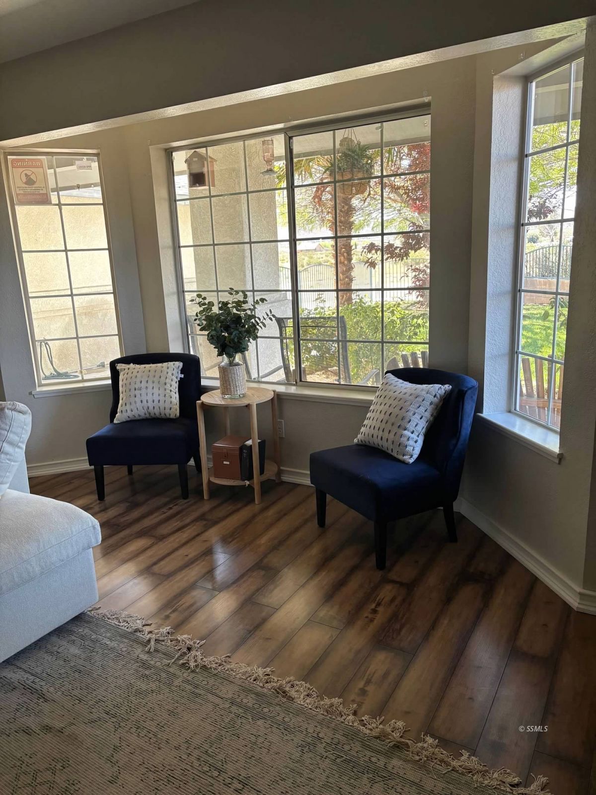 424 Olive Avenue Ridgecrest, CA 93555 - Photo 9 of 46 a living room with furniture and a window