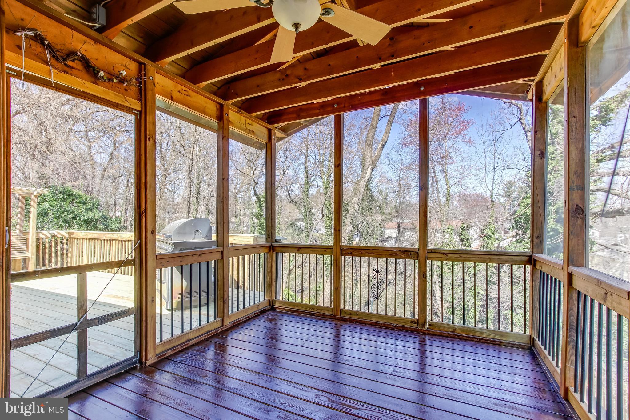 3608 Lakota Road Alexandria, VA 22303 - Photo 11 of 32 Screened Porch with Adjoining Deck - Main Level