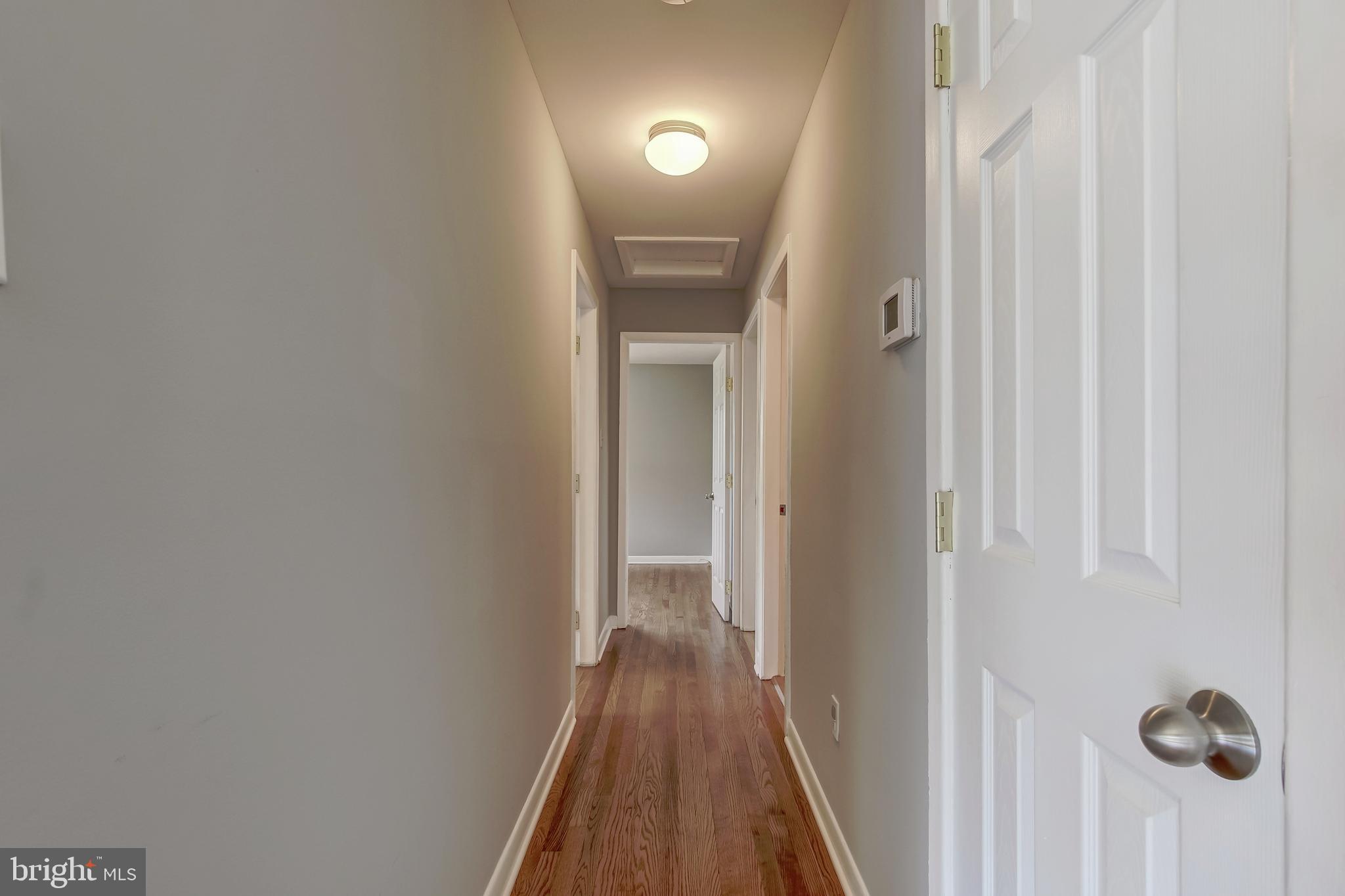 3608 Lakota Road Alexandria, VA 22303 - Photo 14 of 32 Main Level Bedroom Hallway with Hardwood Floors