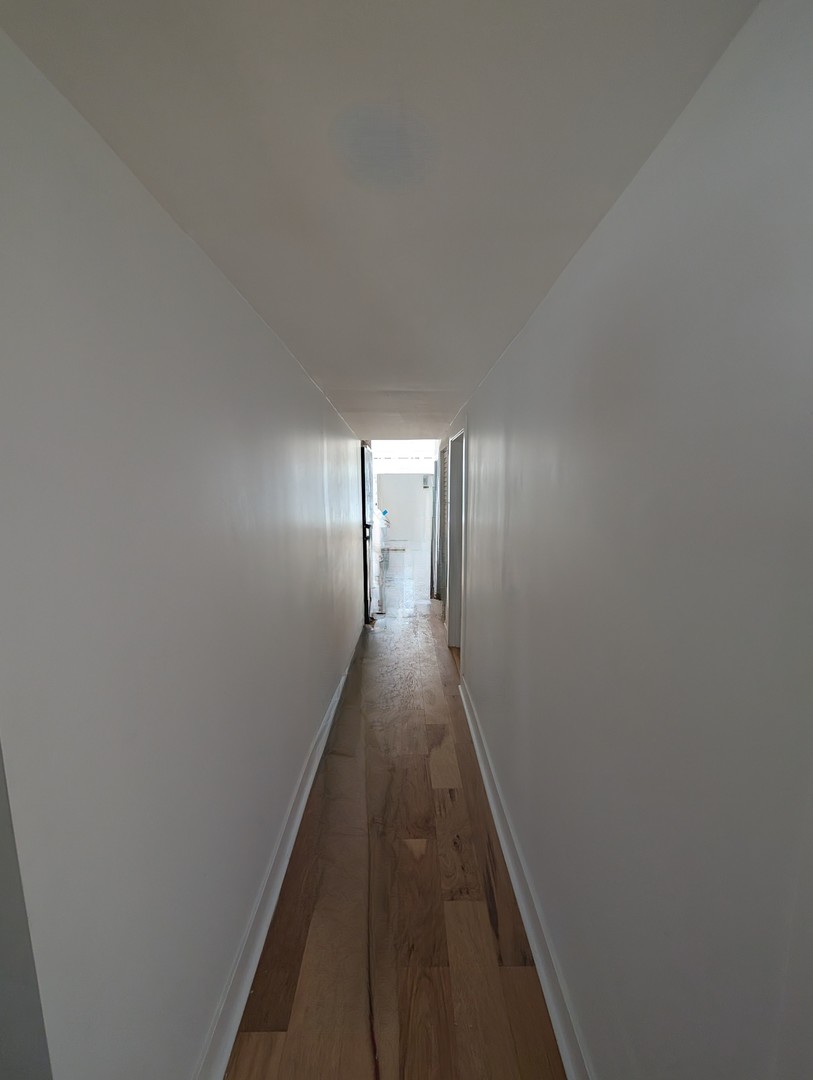 616 West Patterson Avenue, Unit 2E Chicago, IL 60613 - Photo 8 of 18 a view of a hallway
