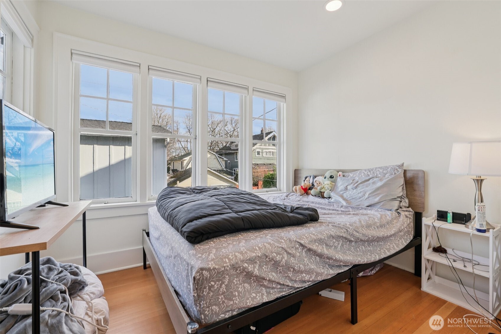 5230 16th Avenue Northeast Seattle, WA 98105 - Photo 14 of 35 a bedroom with a bed and window