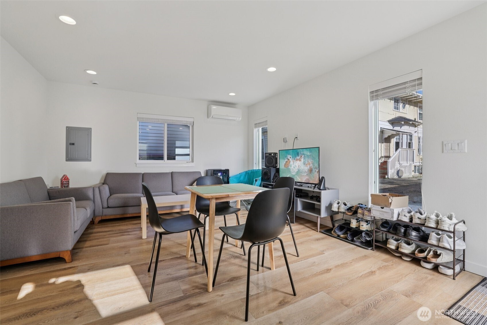 5230 16th Avenue Northeast Seattle, WA 98105 - Photo 24 of 35 a view of a dining room with furniture and wooden floor