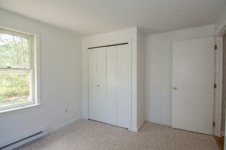 105 Cammett Road Marstons Mills, MA 02648 - Photo 13 of 21 a view of an empty room with a window