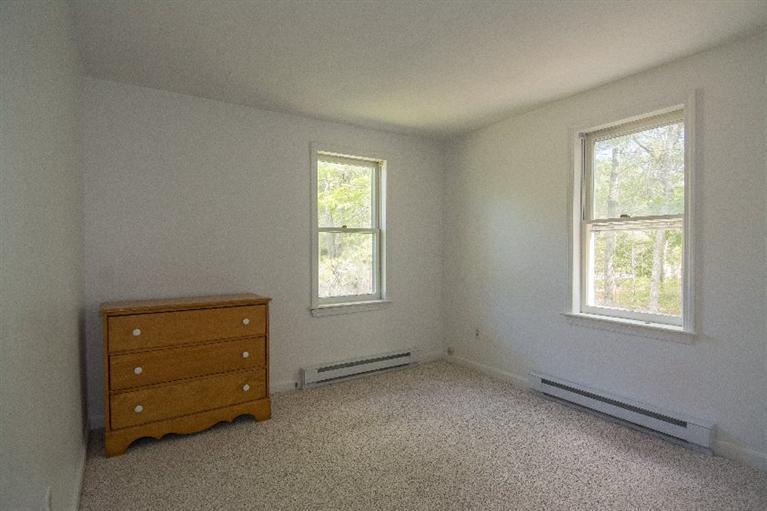 105 Cammett Road Marstons Mills, MA 02648 - Photo 14 of 21 an empty room with windows and closet