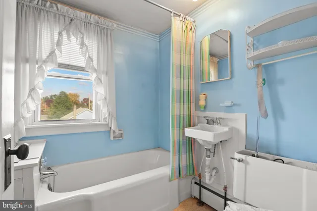 a view of a big room with windows