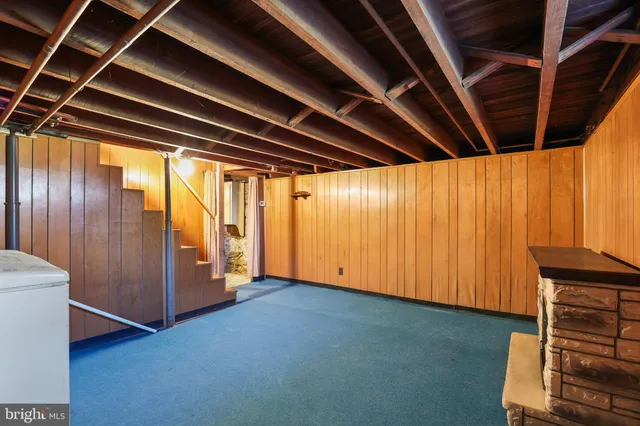 a view of a room with storage and utility room