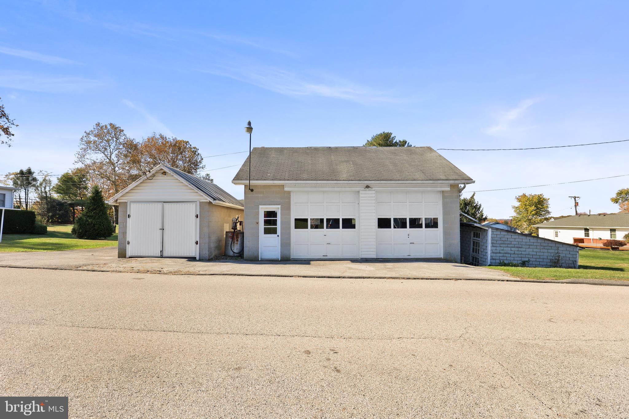 920 North Houcksville Road Hampstead, MD 21074 - Photo 8 of 36 a front view of house with yard and trees in the background