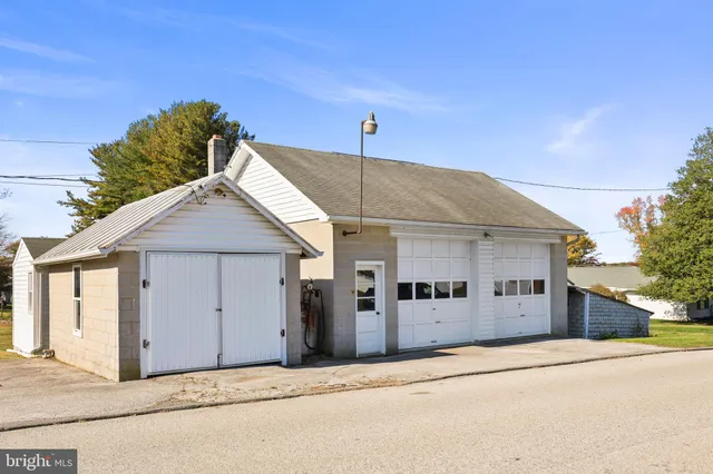 a view of a house with a garage