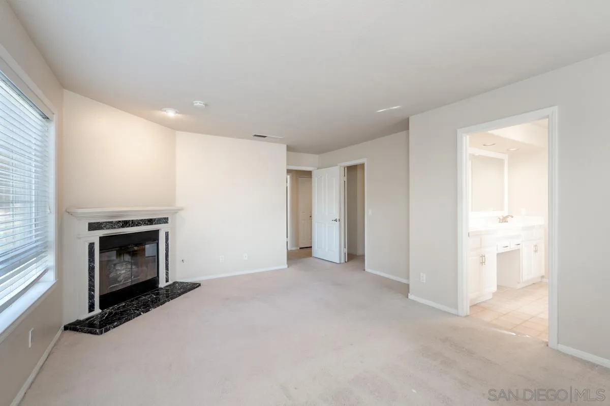 2836 Torrey Pines Road La Jolla, CA 92037 - Photo 20 of 35 a view of empty room with a fireplace