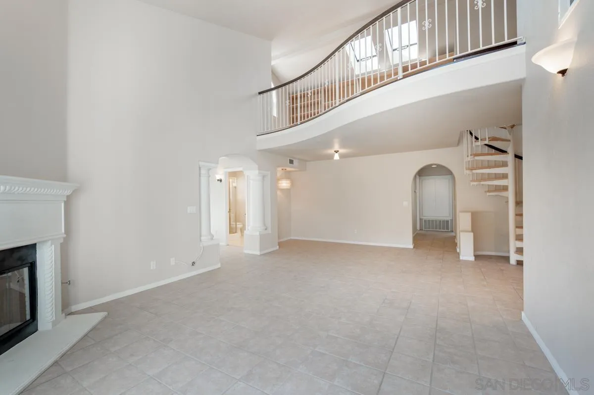 2836 Torrey Pines Road La Jolla, CA 92037 - Photo 7 of 35 a view of a livingroom with an empty space and a fireplace