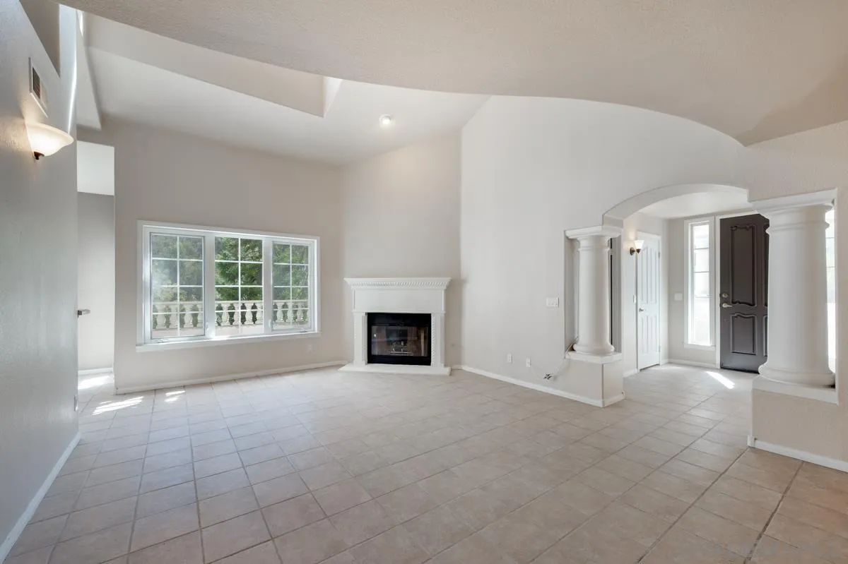 2836 Torrey Pines Road La Jolla, CA 92037 - Photo 9 of 35 a view of a livingroom with an empty space and a fireplace