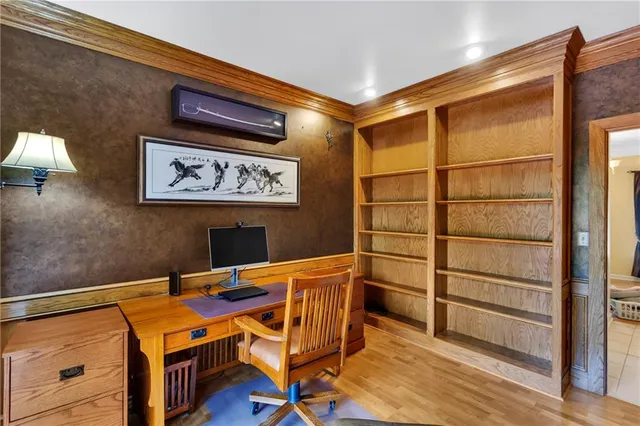 a bathroom with a double vanity sink mirror and shower