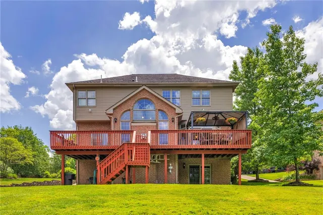 a view of a lake with a big yard