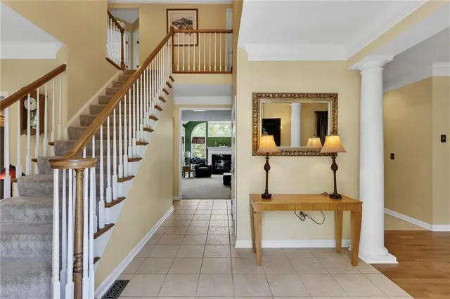 a view of a entryway door with couch
