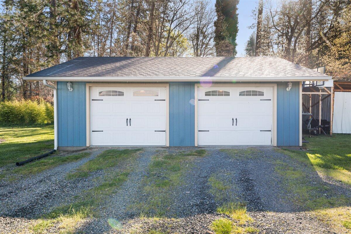 649 Pleasant Valley Road Merlin, OR 97532 - Photo 9 of 57 a view of a house with a outdoor space