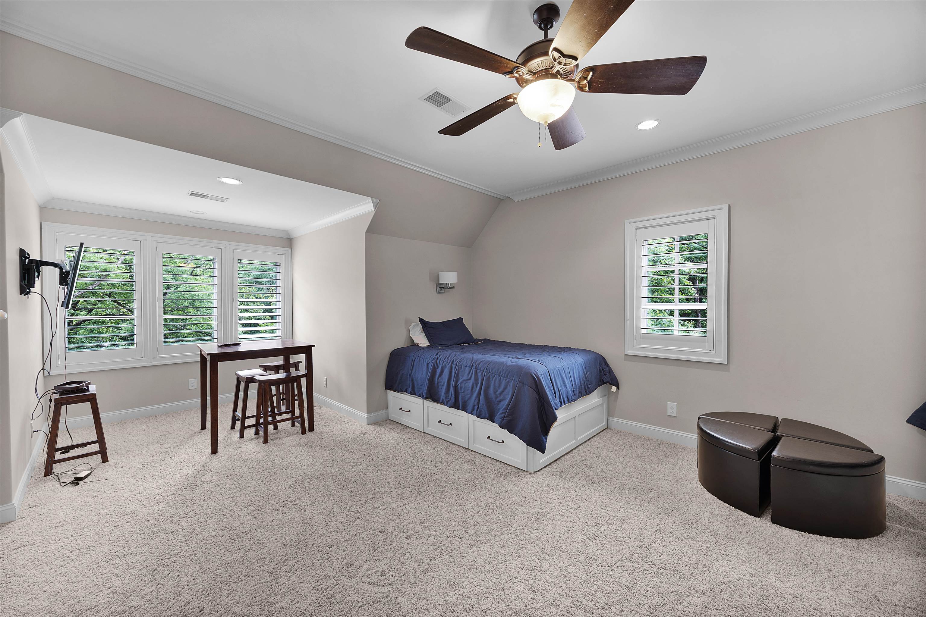 25 Caney Hollow Road Counce, TN 38326 - Photo 34 of 40 Bedroom with multiple windows, baseboards, carpet, ornamental molding, and vaulted ceiling