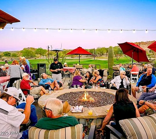 a dining room with furniture window and a floor to ceiling window