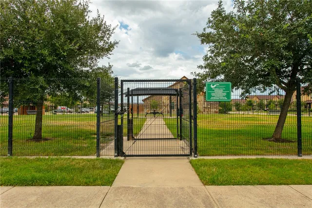 a view of a garden with a slide