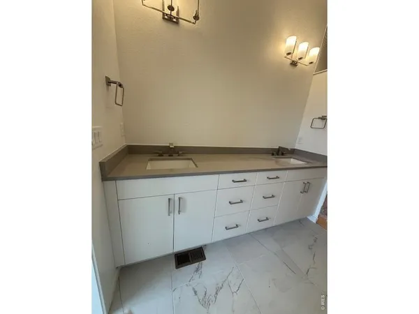 a view of a room with a hallway