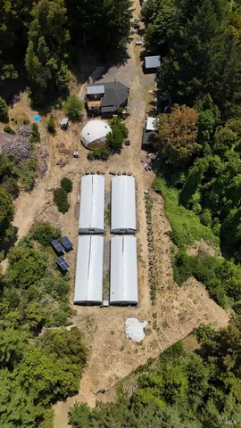 an aerial view of residential house with outdoor space