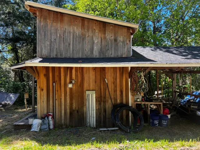 swimming pool view with a seating space