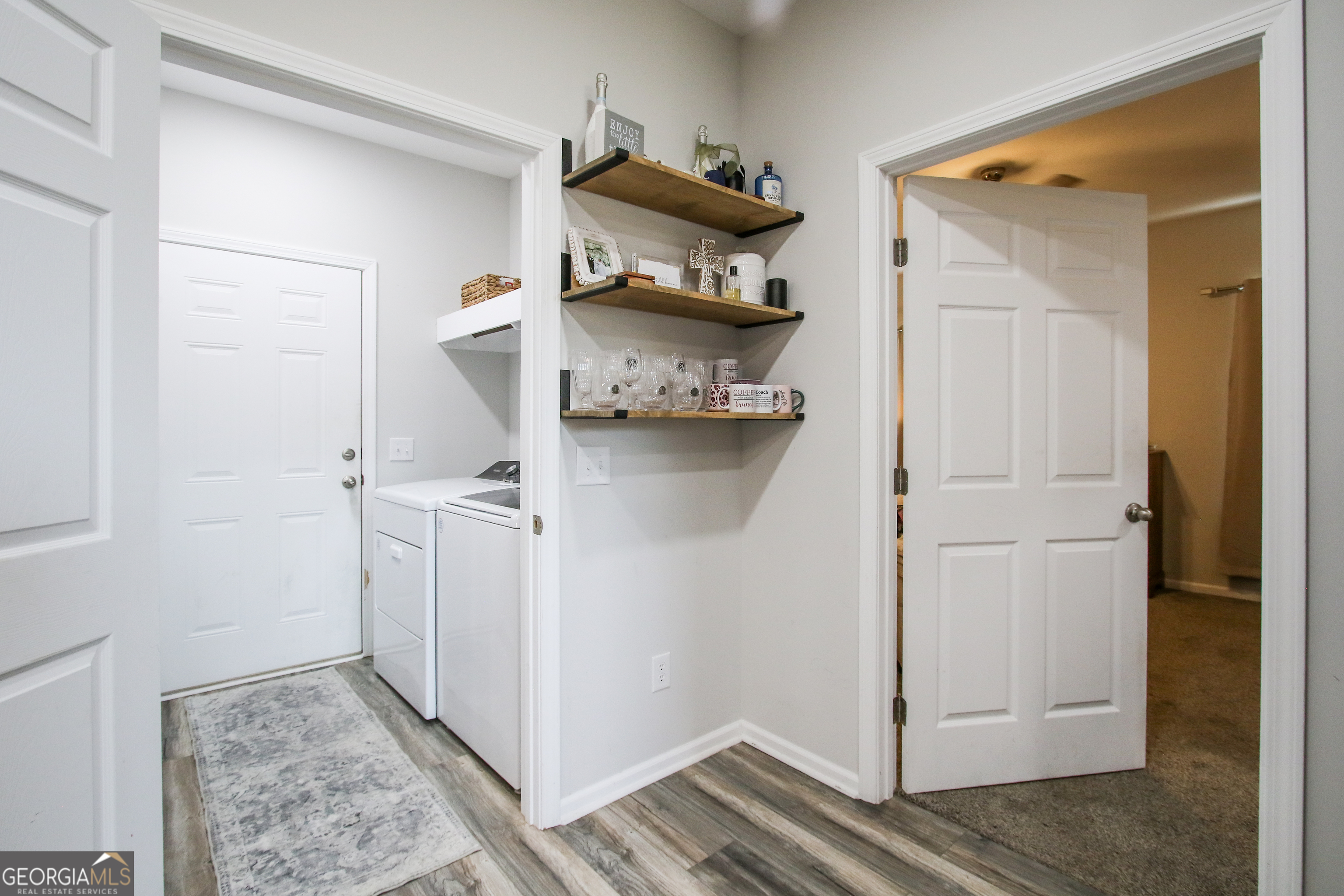 11769 Henry Street Collins, GA 30421 - Photo 39 of 51 a view of a storage & utility room