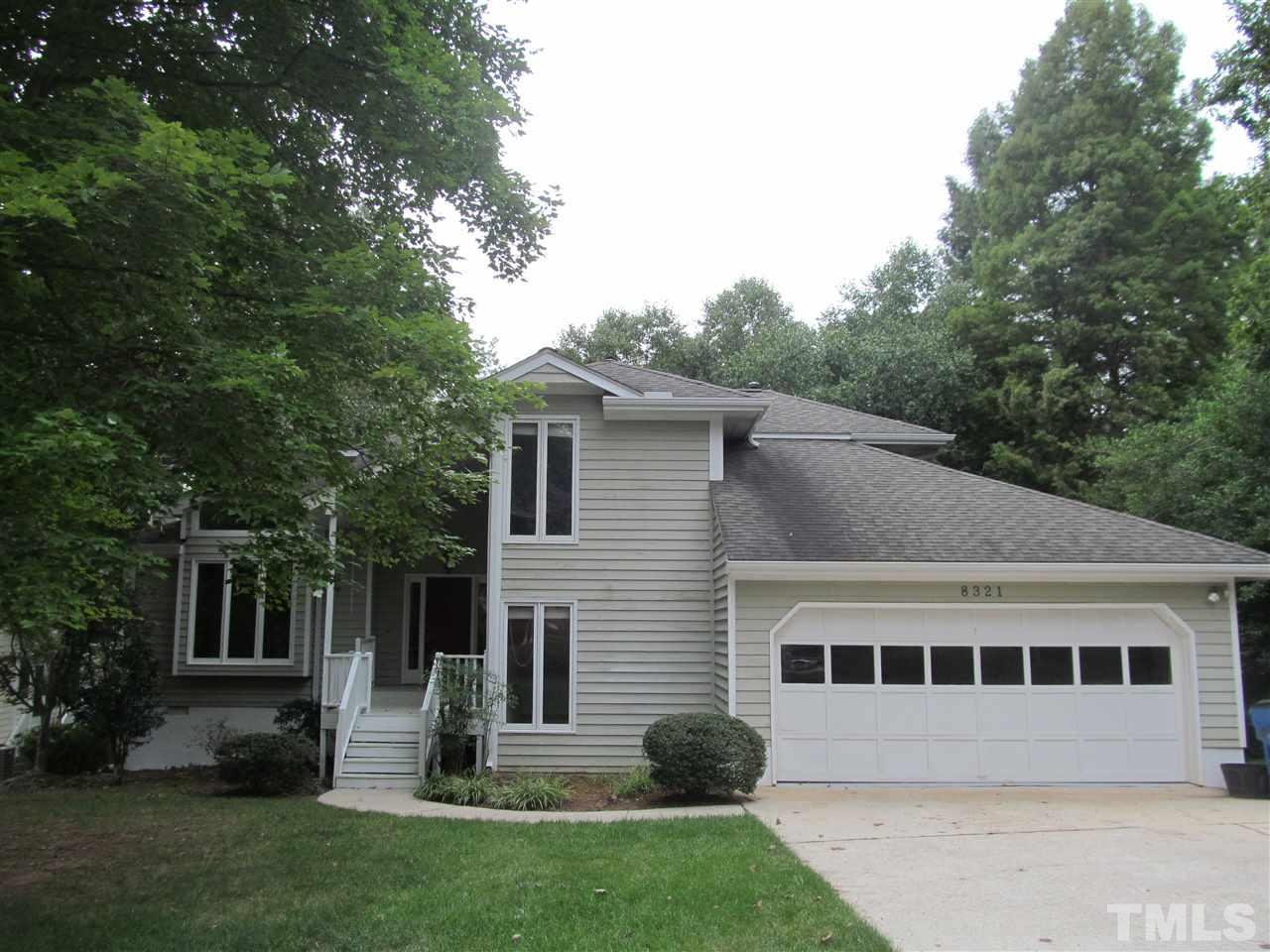 a house view with a garden space