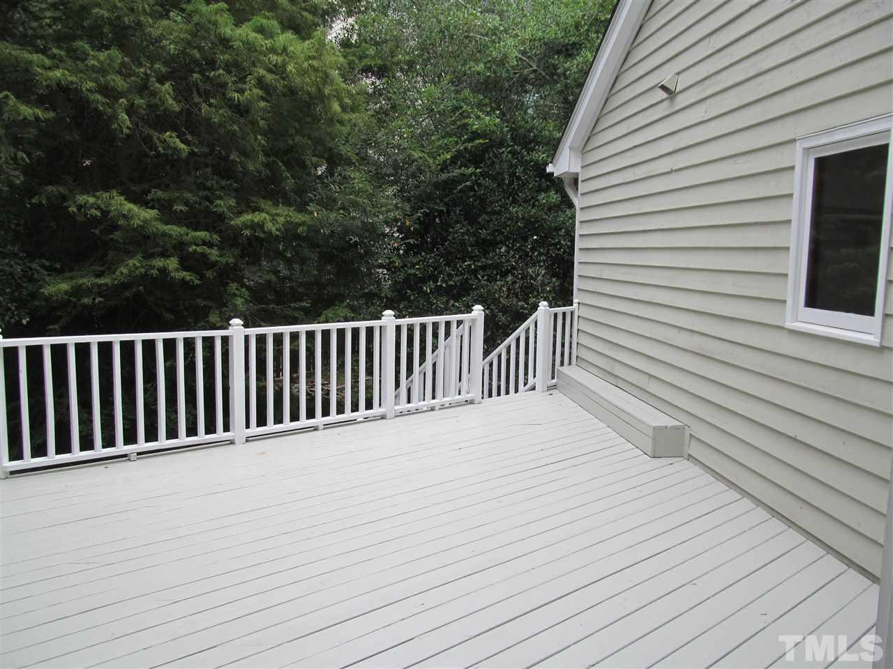 8321 Stryker Court Raleigh, NC 27615 - Photo 13 of 13 a view of a wooden deck