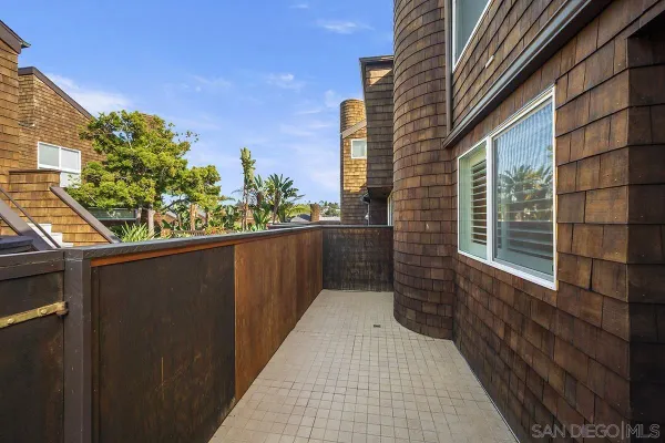 a view of a balcony with an outdoor space