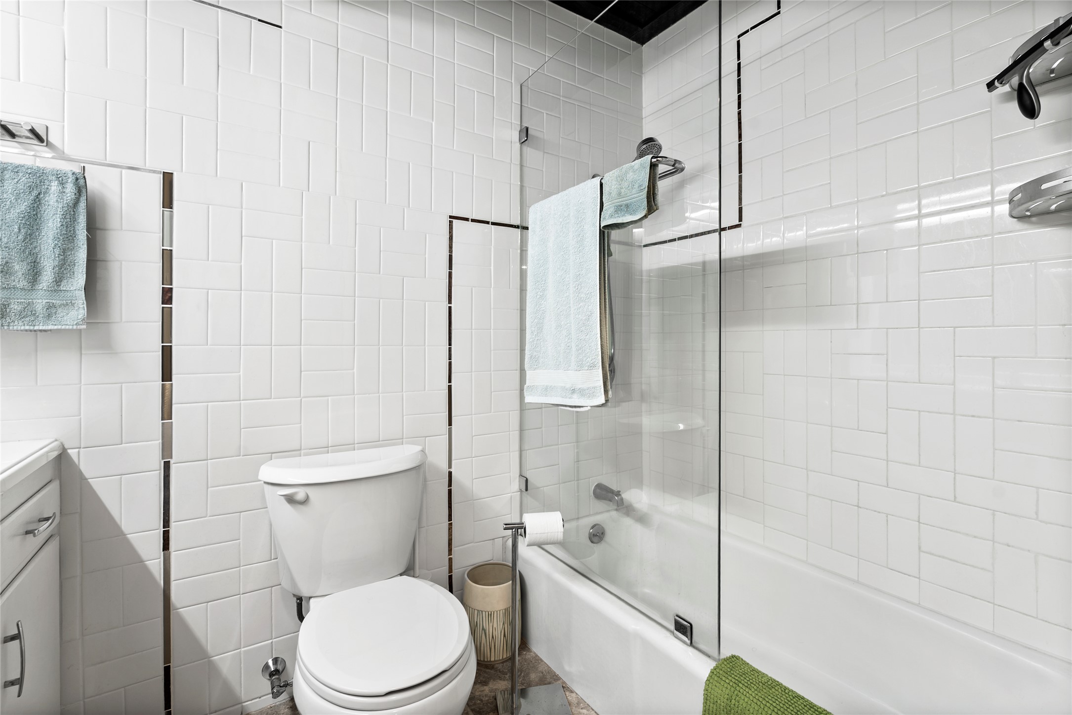 204 Taylor Road Elgin, TX 78621 - Photo 25 of 39 a white toilet sitting next to a bath tub shower