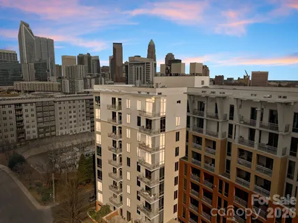 a view of a city with tall buildings