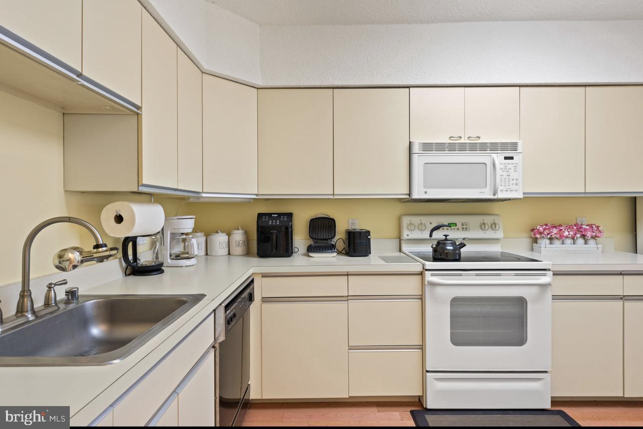 5501 Seminary Road, Unit 801S Falls Church, VA 22041 - Photo 16 of 32 a view of a kitchen with sink a stove and refrigerator