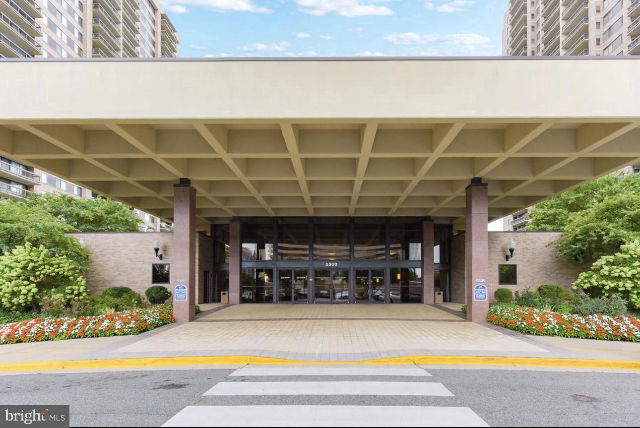 5501 Seminary Road, Unit 801S Falls Church, VA 22041 - Photo 2 of 32 a view of a swimming pool with a patio and a yard with plants