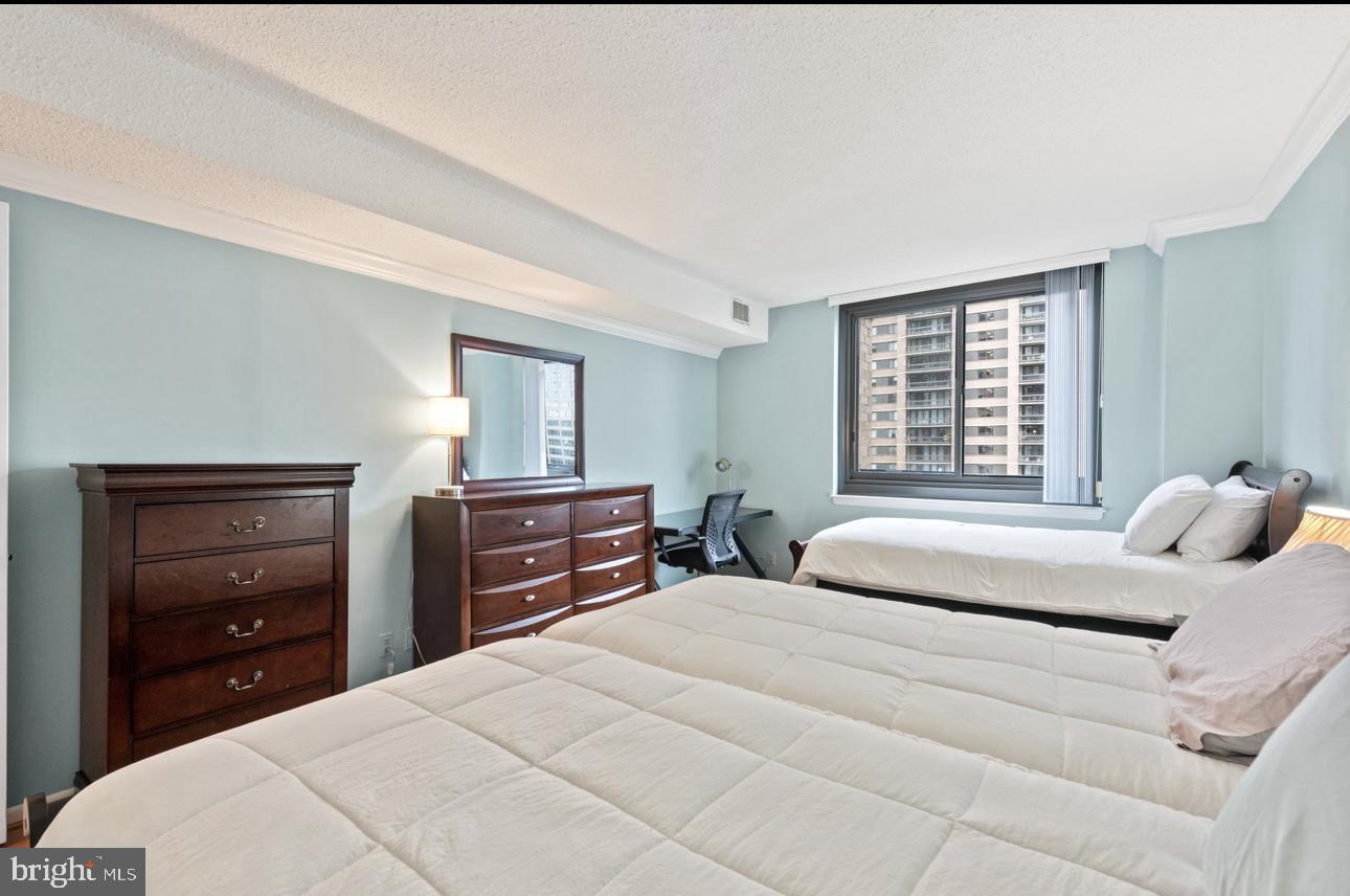 5501 Seminary Road, Unit 801S Falls Church, VA 22041 - Photo 21 of 32 a bedroom with a bed and a closet