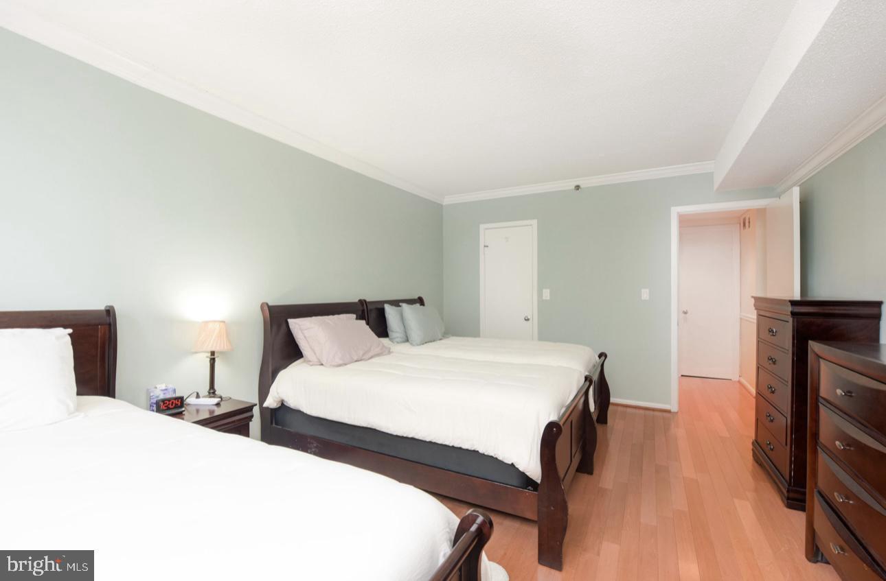 5501 Seminary Road, Unit 801S Falls Church, VA 22041 - Photo 22 of 32 a bedroom with a bed and a flat screen tv