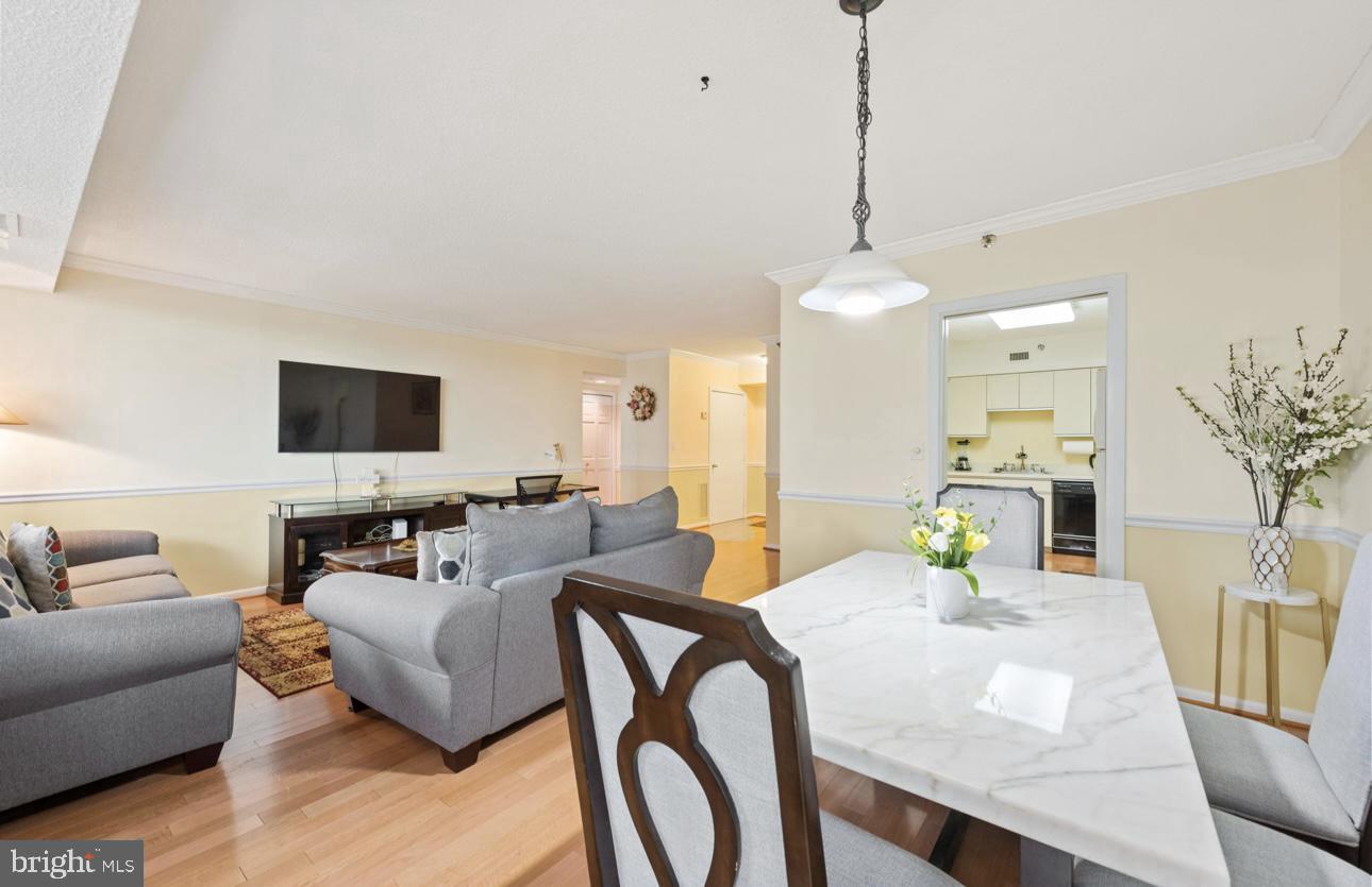 5501 Seminary Road, Unit 801S Falls Church, VA 22041 - Photo 10 of 32 a living room with furniture and a flat screen tv