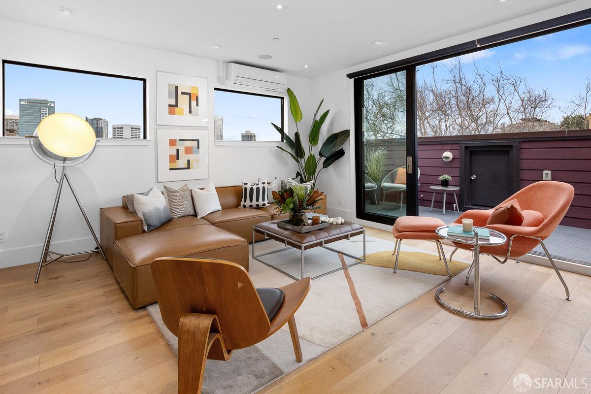 564 Fell Street San Francisco, CA 94102 - Photo 3 of 82 a living room with furniture and a large window