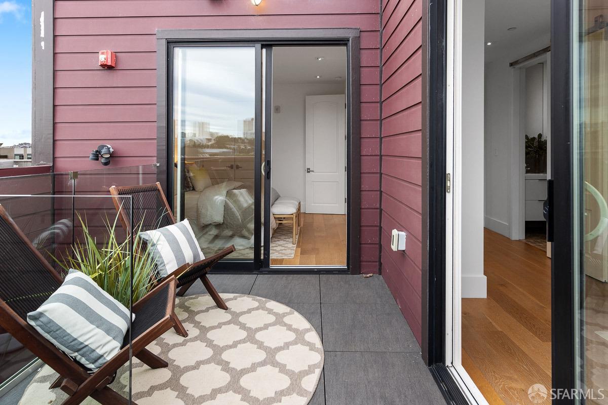 564 Fell Street San Francisco, CA 94102 - Photo 33 of 82 a view of a balcony with chair and table
