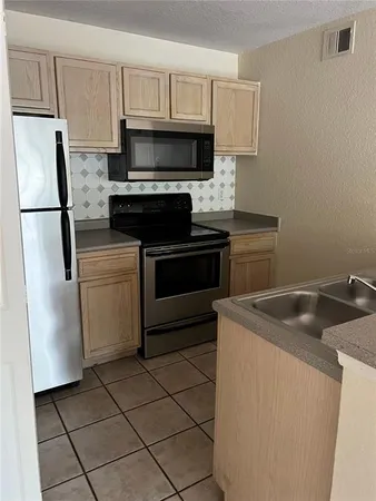 $1,395 | 8939 Latrec Avenue, Unit 1203, Orlando, FL 32819