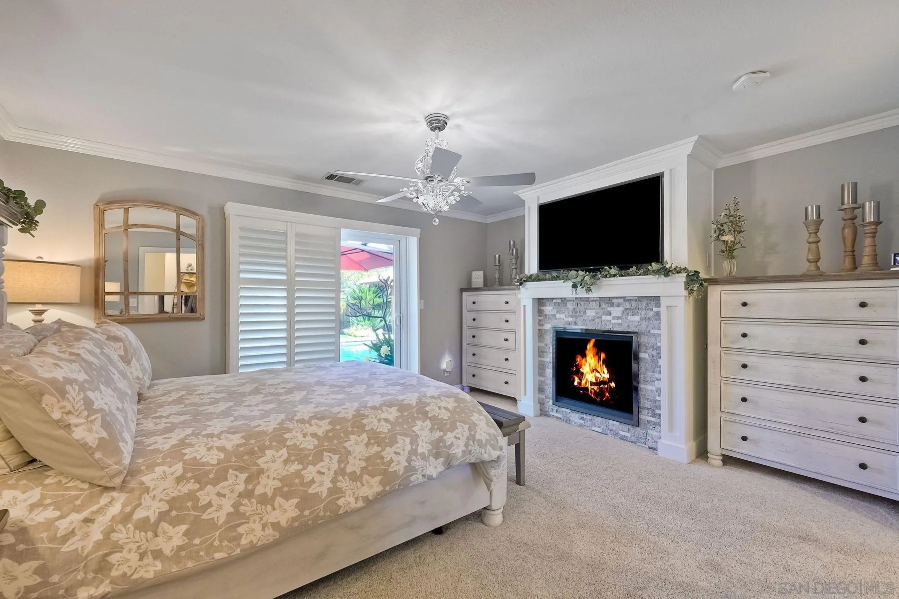 13821 Eisenhower Avenue Poway, CA 92064 - Photo 20 of 37 a spacious bedroom with a bed and a flat screen tv