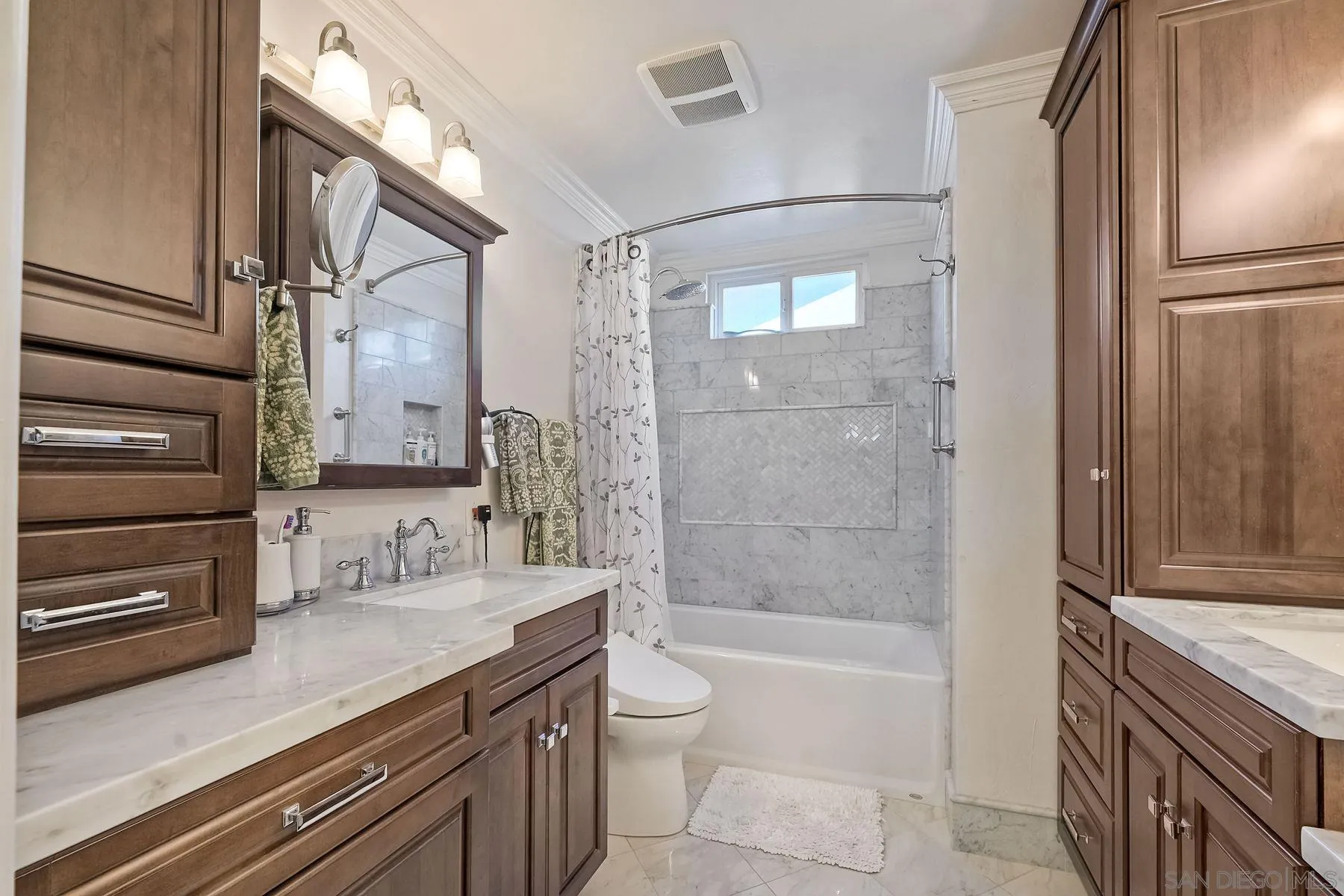 13821 Eisenhower Avenue Poway, CA 92064 - Photo 21 of 37 a bathroom with a granite countertop sink a toilet and shower