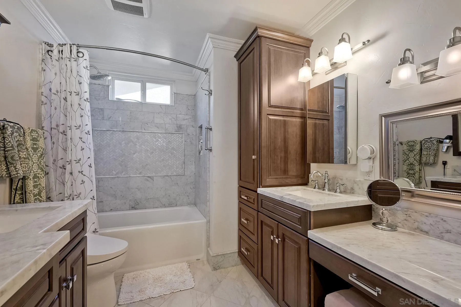 13821 Eisenhower Avenue Poway, CA 92064 - Photo 22 of 37 a bathroom with a granite countertop sink a toilet and shower