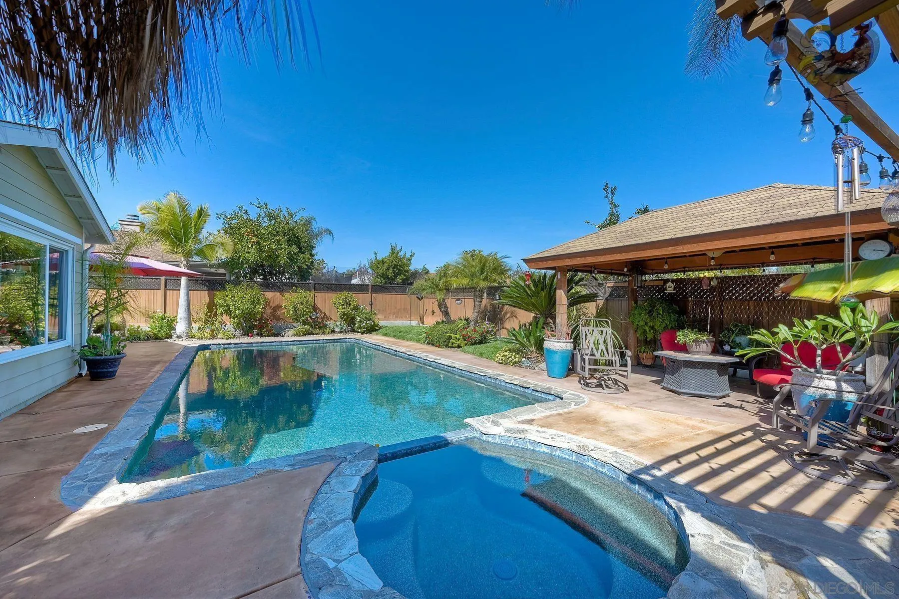 13821 Eisenhower Avenue Poway, CA 92064 - Photo 26 of 37 a view of a swimming pool with sitting area