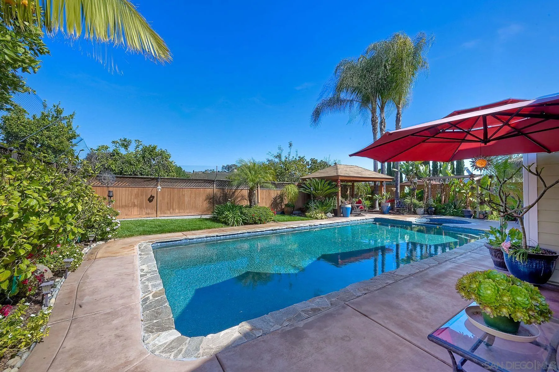 13821 Eisenhower Avenue Poway, CA 92064 - Photo 27 of 37 a view of a house with patio