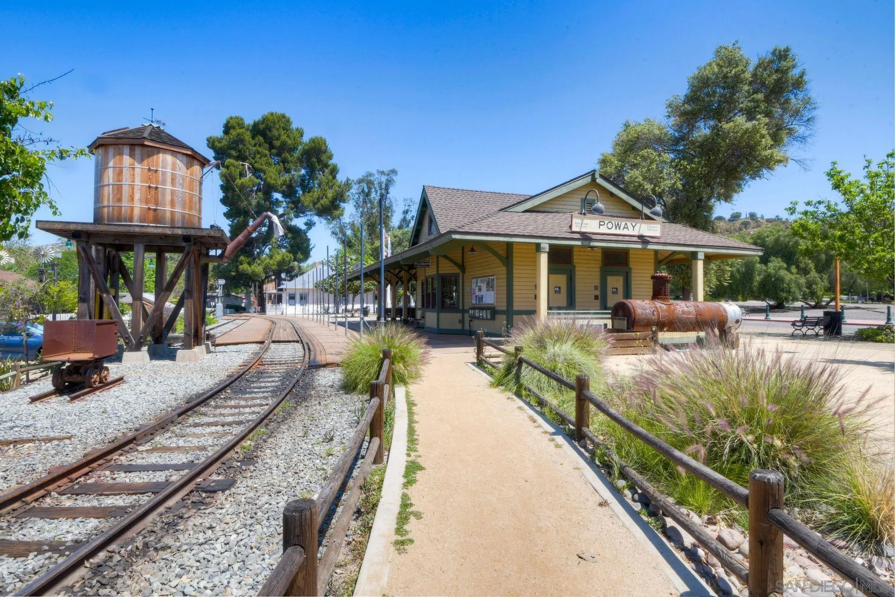 13821 Eisenhower Avenue Poway, CA 92064 - Photo 29 of 37 a front view of a house with a yard