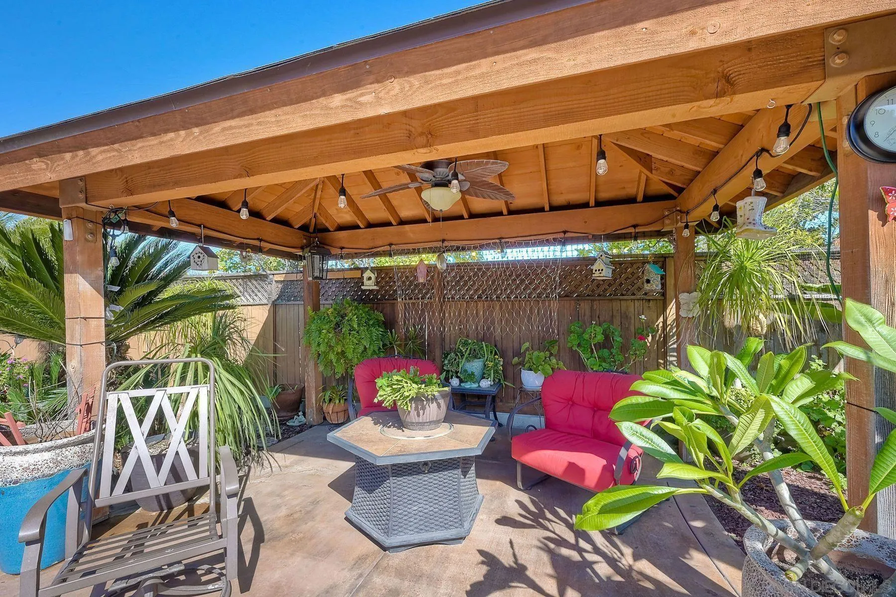 13821 Eisenhower Avenue Poway, CA 92064 - Photo 3 of 37 a patio with glass top table and chairs